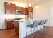 Thumbnail 3 of 29 - Eat-In Kitchen Design at Cedar Place Apartments, Cedarburg, WI, 53012