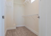 Thumbnail 7 of 29 - Generous Walk-In Closets with Shelving at Cedar Place Apartments, Cedarburg, Wisconsin