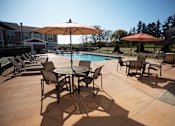 Thumbnail 14 of 29 - Beautiful Swimming Pool with Spacious Deck Area at Cedar Place Apartments, Cedarburg, WI, 53012