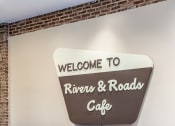 Thumbnail 45 of 45 - a sign that says welcome to rivers  roads cafe