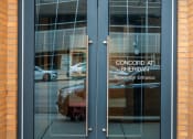 Thumbnail 6 of 45 - the entrance to the concord with cars reflected in
