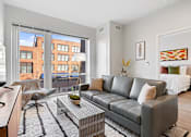 Thumbnail 16 of 50 - Large Living Room With Ceramic Tile Flooring at 23rd Place Apartments, Chicago, 60616