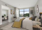 Thumbnail 17 of 45 - a bedroom with a large bed and a window