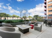 Thumbnail 8 of 45 - a patio with chairs and a table on a balcony at Concord at Sheridan
