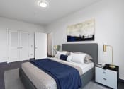 Thumbnail 8 of 59 - A bedroom with a bed, nightstand, and a painting on the wall.
