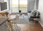 Thumbnail 6 of 17 - Studio Elite Layout with plank wood flooring, large patio, dining seating, couch, and television