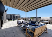 Thumbnail 4 of 18 - A patio with a table and chairs under a roof.