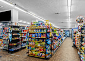 Thumbnail 19 of 19 - Convenience store with snacks and beverages at Dominion Towers Apartments, Arlington, VA 22204