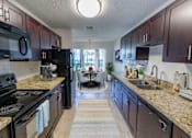 Thumbnail 8 of 16 - Kitchen with Dark Cabinets