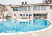 Thumbnail 22 of 36 - our swimming pool is in front of at Juniper Springs Apartments, Austin, TX