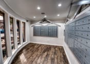 Thumbnail 32 of 36 - a wine cellar with a wooden floor and glass doors