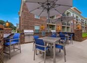 Thumbnail 18 of 44 - Outdoor Kitchen with Gas Grills at Ardmore at the Trail, Indian Trail, NC, 28079