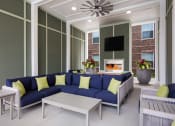 Thumbnail 17 of 44 - Outdoor Pavilion with Fireplace, TV and Lounge Seating at Ardmore at the Trail, Indian Trail, NC