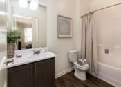 Thumbnail 11 of 44 - a bathroom with a toilet sink and bathtub at Ardmore at the Trail, Indian Trail, 28079