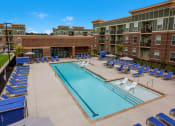 Thumbnail 15 of 44 - Resort-Style Swimming Pool with Sun Shelf and Fountains at Ardmore at the Trail, Indian Trail, NC