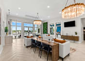 Thumbnail 3 of 30 - A modern dining room with a wooden table and chairs.