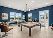 Thumbnail 4 of 30 - A room with a pool table and a bar area.