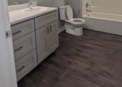 Thumbnail 5 of 115 - a bathroom with a sink toilet and a shower