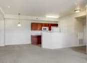 Thumbnail 14 of 137 - a view of a white room with a red door