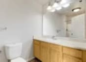 Thumbnail 12 of 137 - a bathroom with a sink and a mirror