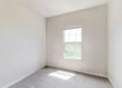 Thumbnail 2 of 137 - an empty room with a window in it