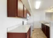 Thumbnail 8 of 137 - a kitchen with a white counter top and