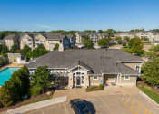 Thumbnail 44 of 137 - an aerial view of a large house with a swimming pool