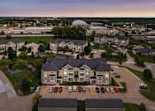Thumbnail 119 of 137 - an aerial view of a neighborhood with houses and parking lot
