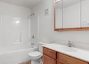 Thumbnail 36 of 38 - a bathroom with a sink toilet and a bath tub