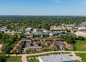 Thumbnail 6 of 38 - an aerial view of a neighborhood with houses and trees