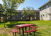 Thumbnail 12 of 38 - our apartments have a picnic area in the grass