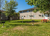 Thumbnail 13 of 38 - our apartments have a spacious yard with picnic tables