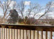 Thumbnail 40 of 45 - the view from the deck of a house overlooking a yard and trees