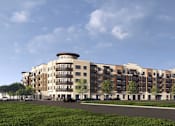 Thumbnail 1 of 16 - A large apartment building with the name "BENJAMIN" on the top.