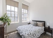 Thumbnail 4 of 16 - The Bell Apartments at 216 East State Street Bedroom