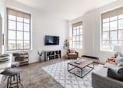 Thumbnail 1 of 16 - The Bell Apartments at 216 East State Street Living Room