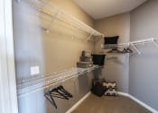 Thumbnail 33 of 44 - a walk in closet in a bedroom  at Victoria Park and V2 Apartments, St. Paul, MN, 55102