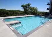 Thumbnail 38 of 44 - Outdoor Lap Pool & Sundeck with Grilling Stations  at Victoria Park and V2 Apartments, Minnesota