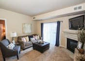 Thumbnail 2 of 11 - Living Area With Fireplace at The Communities of River Crossing, Saint Paul, 55116