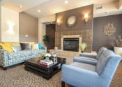 Thumbnail 5 of 11 - Clubroom With Fireplace at The Communities of River Crossing, Saint Paul, 55116