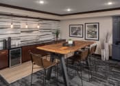 Thumbnail 21 of 42 - Lounge area with tables, chairs, and breakfast nook  at The Whitley, St. Paul, 55101