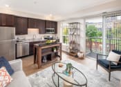 Thumbnail 1 of 42 - View of modern living room and kitchen area  at The Whitley, St. Paul
