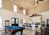 Thumbnail 7 of 25 - Clubhouse With Billiards Table at Puller Place Apartments, Jacksonville, NC