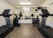 Thumbnail 12 of 25 - Gym at Puller Place Apartments, Jacksonville