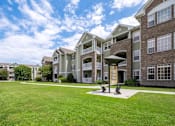 Thumbnail 4 of 25 - Green Landscape at Puller Place Apartments, North Carolina, 28546