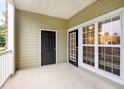 Thumbnail 25 of 25 - A black door is on the left and a white door is on the right.