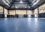 Thumbnail 9 of 25 - Indoor Basketball Court at Puller Place Apartments, Jacksonville, North Carolina
