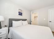 Thumbnail 17 of 35 - Large Bed in Bedroom at The Promenade at Easton Apartments, Maryland