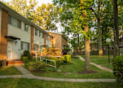 Thumbnail 1 of 14 - Beautiful Landscaping with Mature Trees at Prince Georgetown Apartments, Riverdale, MD
