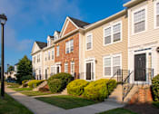 Thumbnail 23 of 50 - Exterior with garden at Townes at Village Center, Reisterstown